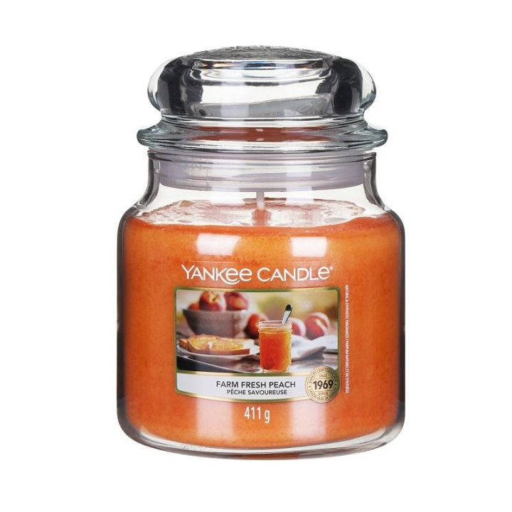 Yankee Candle Classic Medium Jar Farm Fresh Peach 411g in de groep BEAUTY & HEALTH / Geuren & Parfum / Overige geuren / Geurkaarsen bij TP E-commerce Nordic AB (C00646)