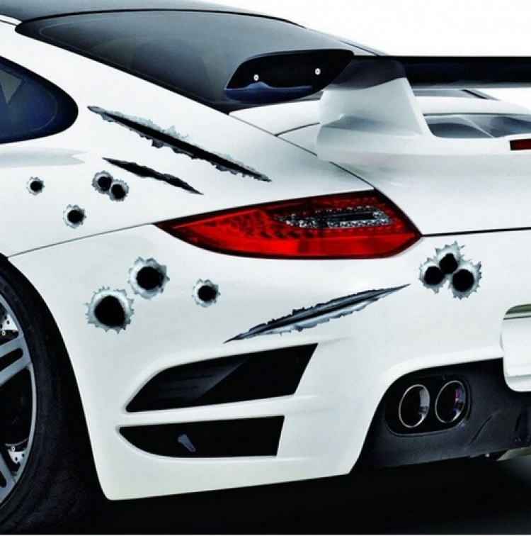 Stoere stickers voor auto/motor - kogelgaten en krabsporen Stoere stickers voor auto/motor - kogelgaten en krabsporen