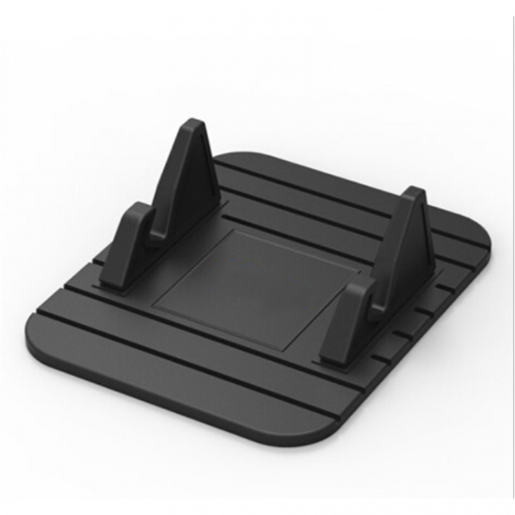 De siliconen mat die je smartphone op zijn plaats houdt.